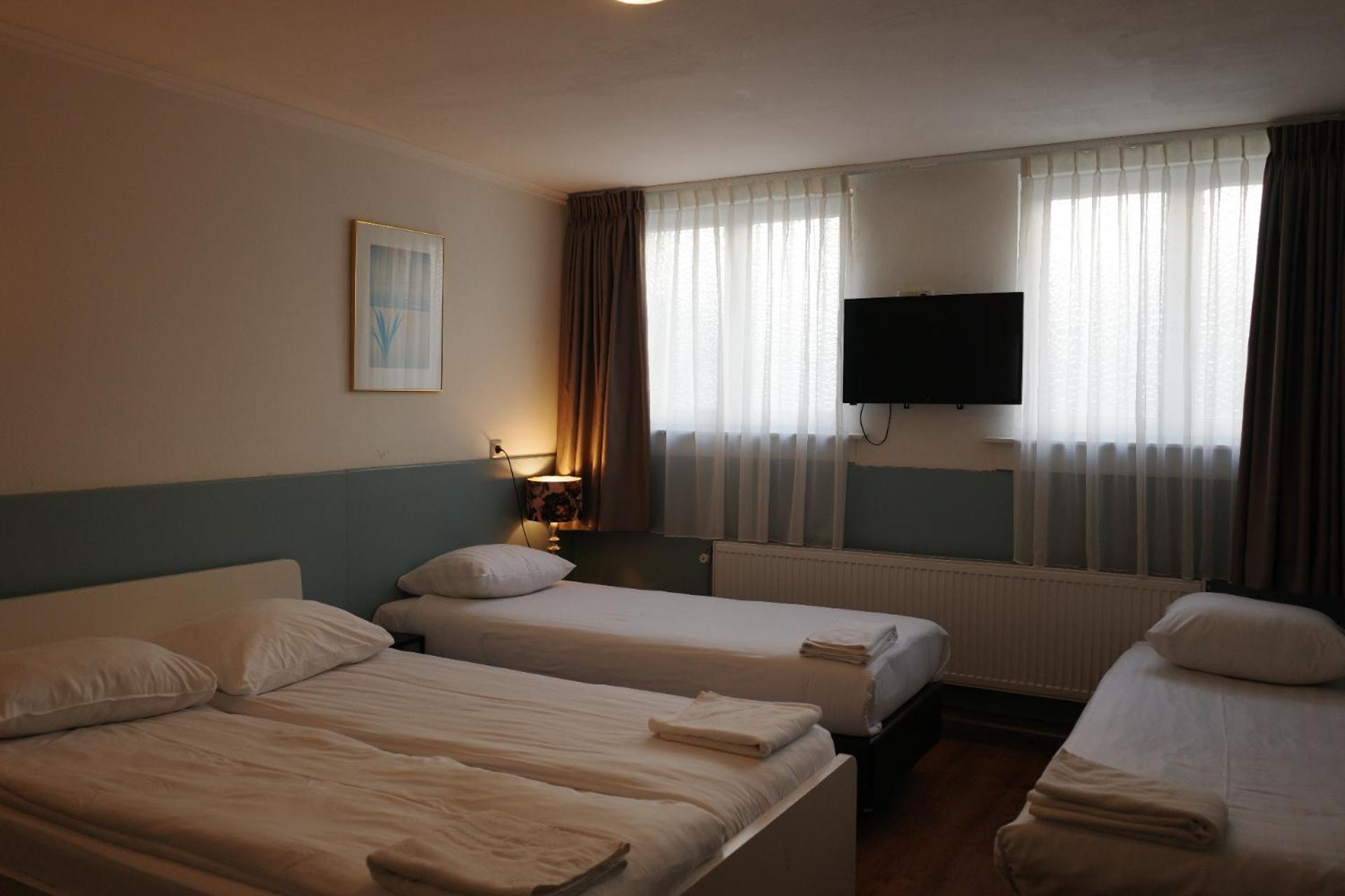 Habitación Cuádruple Estándar con baño privado